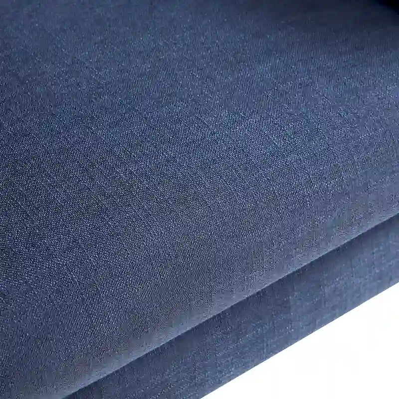 Pellavainen nojatuoli, jossa nappiverhoiltu selkänoja
